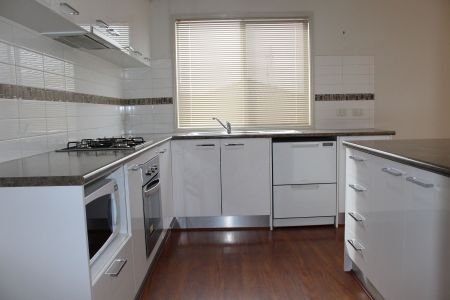 MODERN TOWNHOUSE PACKED WITH FEATURES! - Photo 2