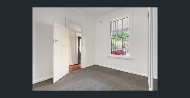 Tidy terrace in tree-lined village neighbourhood - Photo 1