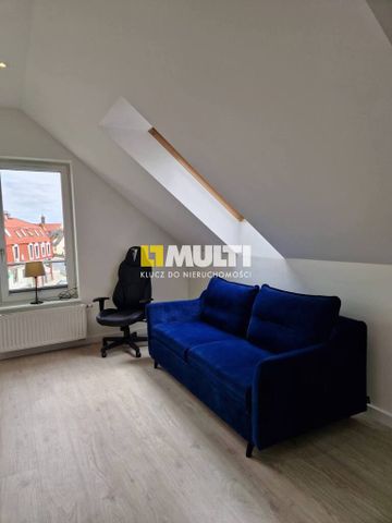 Dwupoziomowe mieszkanie przy ul. Okulickiej - Photo 2