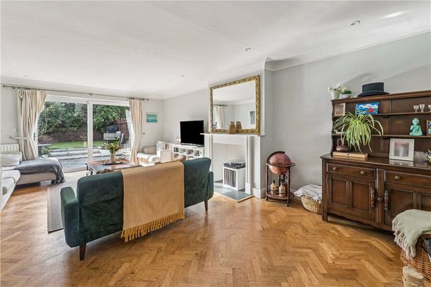 Super 4 bedroom house in the heart of Battersea with 2 bathrooms, a large reception room with doors onto a South facing garden. A quiet street off Battersea Park Road therefore close to Battersea Park, Clapham Junction and buses over to Chelsea. - Photo 1