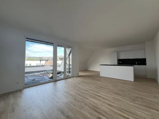 Modernes Wohnen in Top-Lage - Neubau Dachgeschosswohnung in Gütersloh - Photo 1