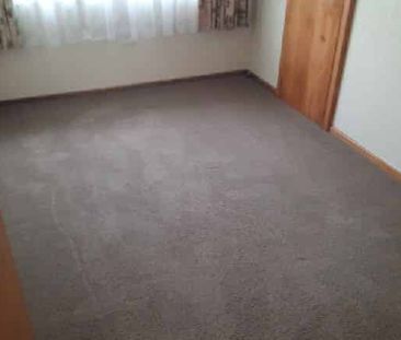 Stylish Two-Bedroom Unit in a Desirable Location - Photo 1