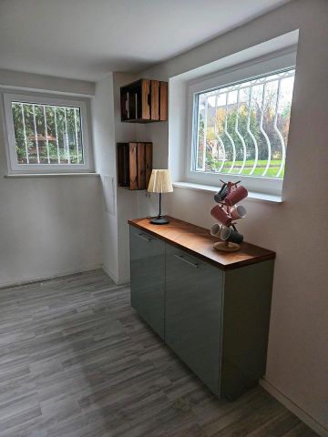 Schöne helle Souterrainwohnung - Photo 3