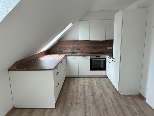 Energieeffizienter Neubau mit moderner Einbauküche in Neuenkirchen zu vermieten! - Photo 1
