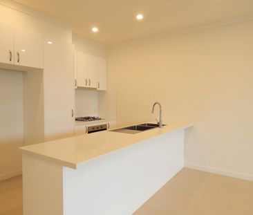 Bright and Spacious with Double Garage! - Photo 2