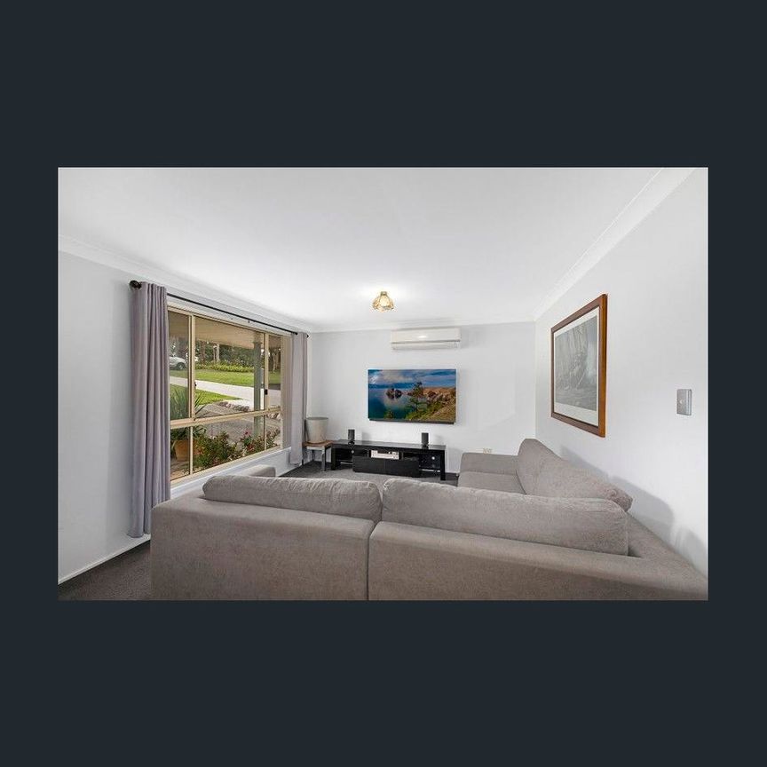 Three Bedroom Home with Room to Relax - Photo 1