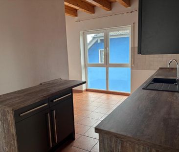 Helle Maisonettewohnung mit Dachterrasse - Foto 1