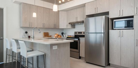 Appartement 2 chambres à louer Laval à Axial Towers - Photo 2