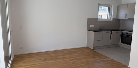Magnifique appartement de 2.5 pièces au 1er étage d'un immeuble neuf avec balcon - E102 - Photo 2