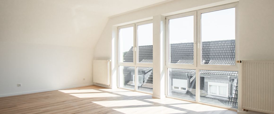 Schick renovierte Dachgeschosswohnung mit Gartennutzung und Einbauküche in Bielefeld Stieghorst - Foto 1