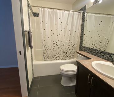 Cozy 2-Bedroom Condo with Underground Parking in Victoria Park - Photo 4