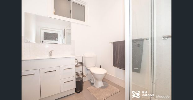 COMFORTABLE CENTRAL FURNISHED HOME - Photo 1