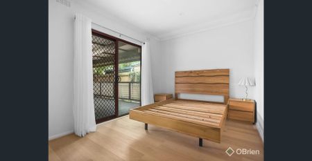 Charming Two-Bedroom Home in Prime Bayside Location - Photo 5