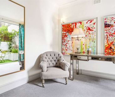 A charming one bedroom apartment with a private patio garden. - Photo 1