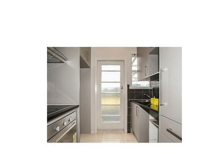 "Close to schools, transport, not on main street" - Photo 2