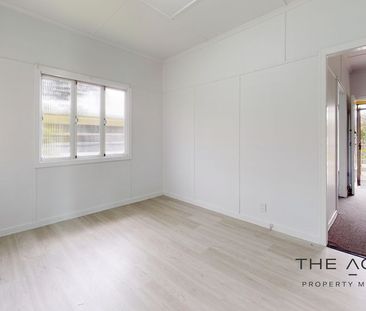 High-set family home in central location - Photo 5