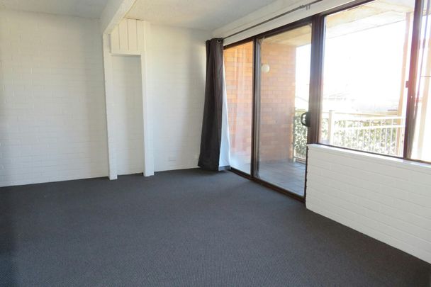 FRESHLY UPDATED 2 BEDROOM UNIT IN THE HEART OF THE CBD! - Photo 1