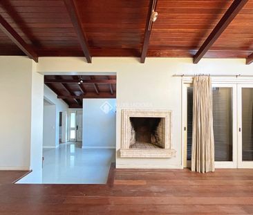 Casa em Condomínio com 3 quartos e 400m² para alugar em Cavalhada, ... - Foto 1