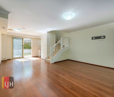 FULLY AIR CONDITIONED THREE-BEDROOM TOWNHOUSE WITH GREAT COURTYARD - Photo 1