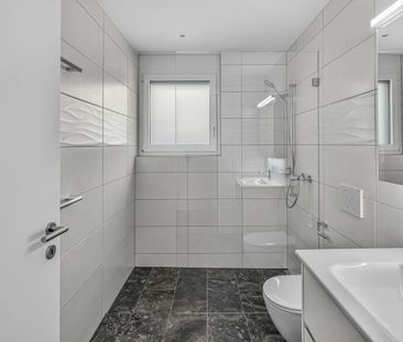 Erstvermietung - Moderne 3.5-Zimmer Wohnung an zentraler Lage - Photo 4