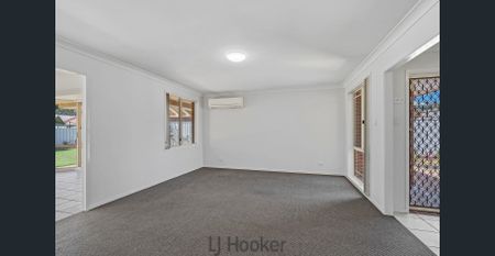 This spacious home is positioned close to Warners Bay High School and just a short drive to the lake, cafes and shops and is packed full of features. - Photo 3