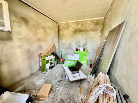 GELIJKVLOERSAPPARTEMENT MET TWEE SLAAPKAMERS EN GARAGE - Photo 4