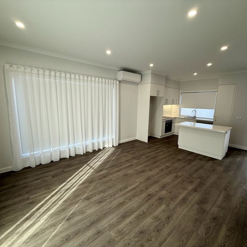 BRAND NEW 2 BEDROOM TOWNHOUSE - Photo 1