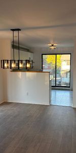 OFFFRE SPÉCIALE 1 MOIS GRATUIT- MAGNIFIQUE 5 1/2 - ENTIÈREMENT RÉNOVÉ - TRIPLEX - Photo 3