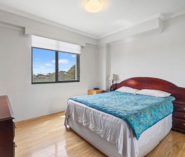 Sleek 2 bedroom apartment in a resort style complex - Photo 2