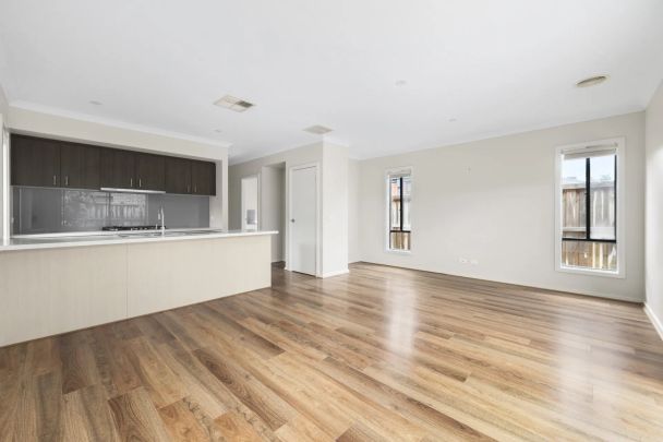 LIGHT-FILLED FAMILY HOME IN A CONVENIENT LOCATION - Photo 1