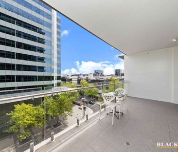 FULLY FURNISHED AT THE "MANHATTAN" - Photo 1