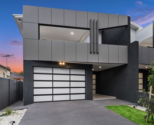 CONTEMPORARY DUPLEX IN PRIME LOCATION - Photo 1