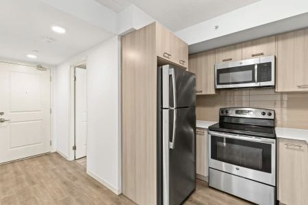 The Cannon Suites — 1 Bedroom + Den and Balcony - Photo 5