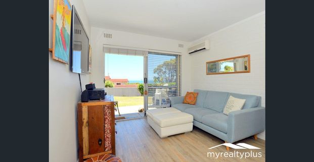 One-Bedroom Unit with Stunning Coastal Charm - Photo 1
