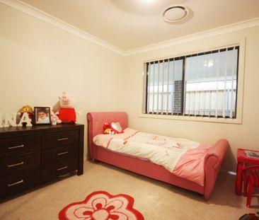 Stylish Family Home Offering Comfort, Space & Convenience - Photo 6