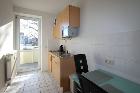 Ihre flexible und möblierte Wohnlösung mit Balkon in perfekter Lage! - Photo 4