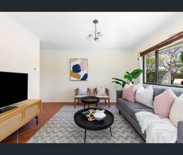 Renovated, Low Maintenance & Family Friendly Home in Ideal Location - Photo 3