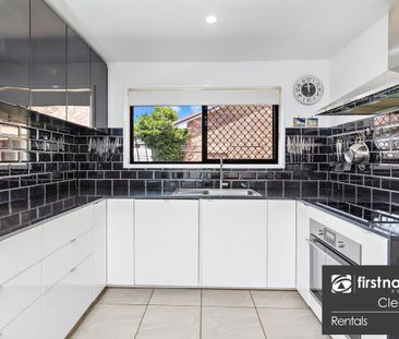 Modern Lowset Family Home with Side Access + Large Shed - Photo 3