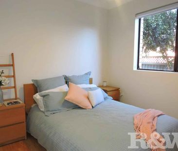 SPACIOUS TWO BEDROOM UNIT WITH COURTYARD - Photo 3