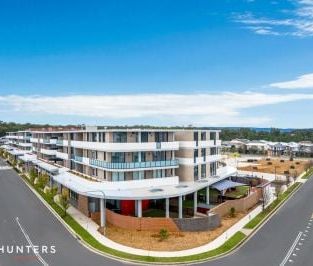 Open Home Meeting Point: Glenmore Village Sales Desk in front of Wo... - Photo 5