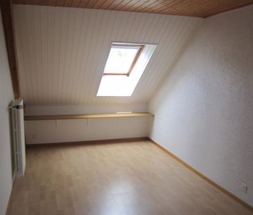 Appartement de 4 pièces au 3ème étage situé au centre du village - Photo 4
