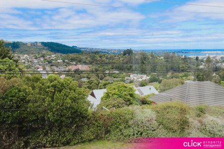 Stunning Executive Home with Sweeping Views and Sunlit Living - Photo 4