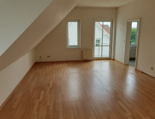 Gemütliche 2-Zi-Dachgeschosswohnung mit Balkon in ruhiger Stadtrandlage von Dresden. - Foto 1