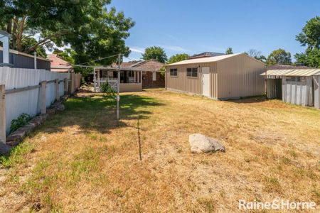 VERSATILE LAKE ALBERT HOME WITH SHEDS AND STUDY - Photo 4