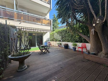 A LOUER - APPARTEMENT MEUBLE 3 PIECES EN REZ-DE-JARDIN A CAGNES-SUR-MER, SECTEUR LAUTIN - Photo 2
