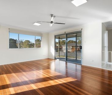Attractive High-Set with Multiple Living Spaces - Photo 3