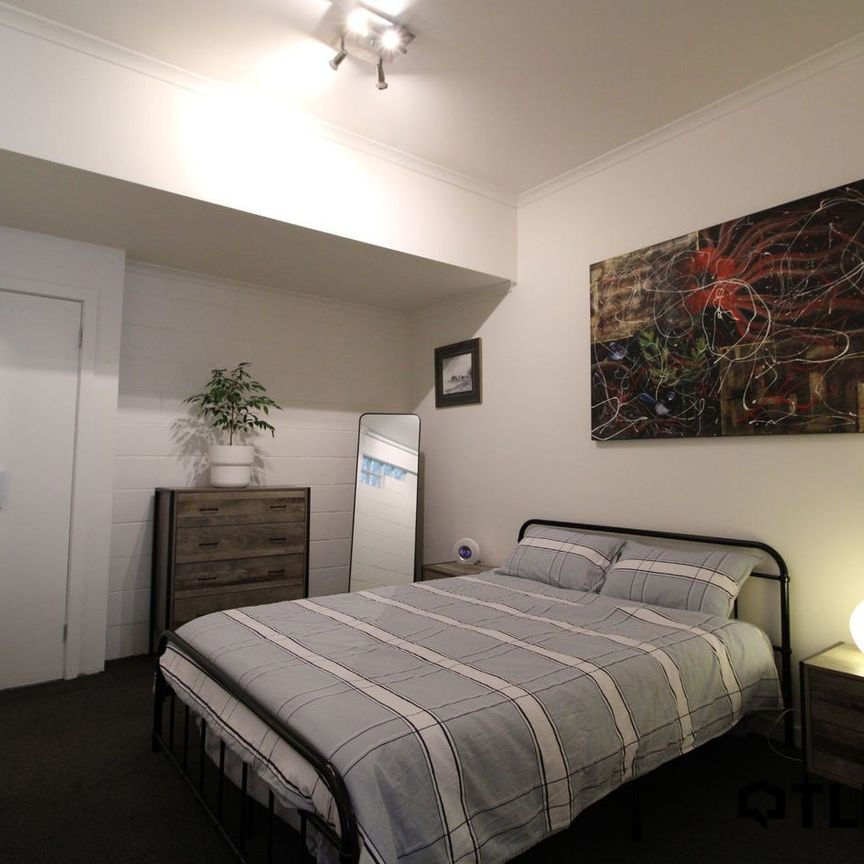 FULLY FURNISHED 1-BEDROOM ENVELOPED IN NATURAL LIGHT - Photo 1