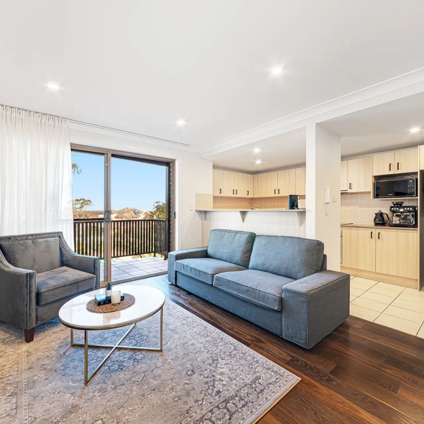 Beautifully Renovated Townhouse-Style Apartment in Resort-Style Complex - Photo 1