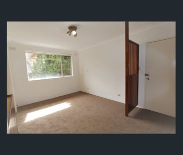 Good Sized Two Bedroom Unit in Convenient Location - Photo 1