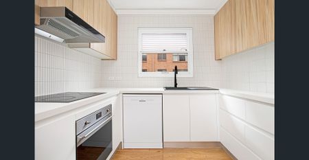 Contemporary 3 Bedroom Unit with Garage - Photo 2